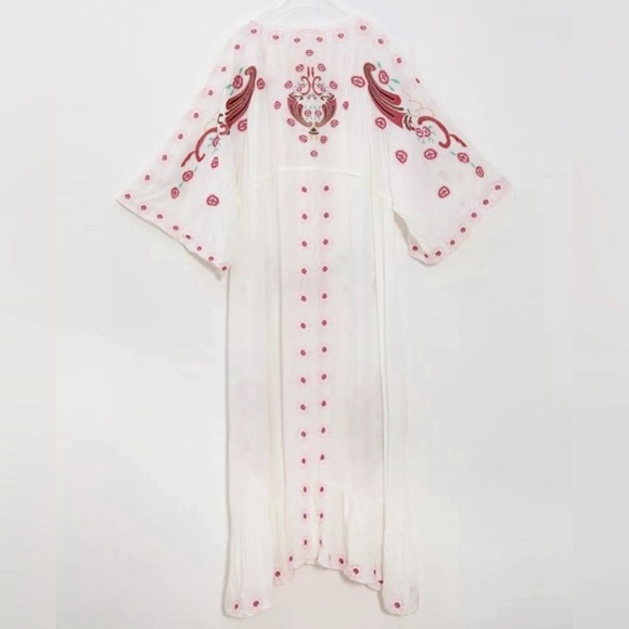 Star
Boho Kimono Embroidered
Eyelet Floral Filigree Magic Maxi Gown
$198 $459 - Picture 6 of 8